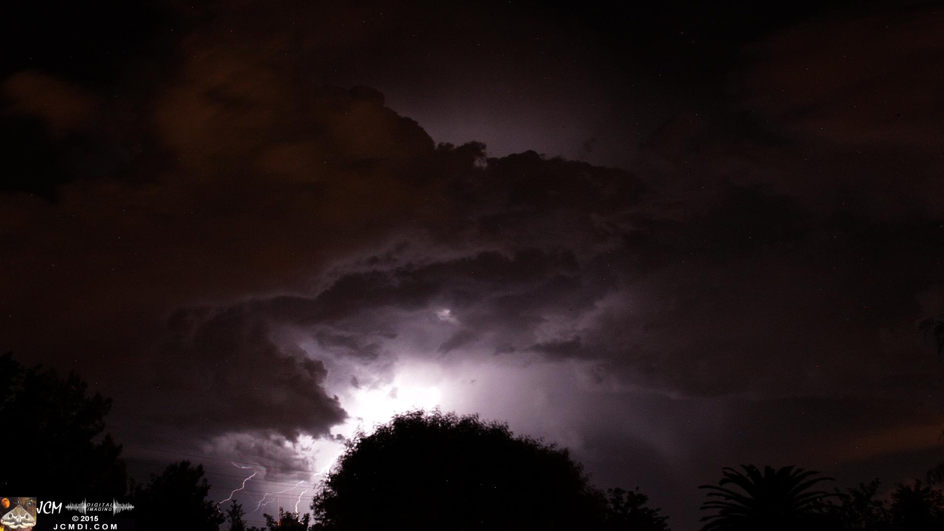 A lightning flash illuminates the night sky over Santa Clarita, Oct. 14, 2015 JCMDI.COM